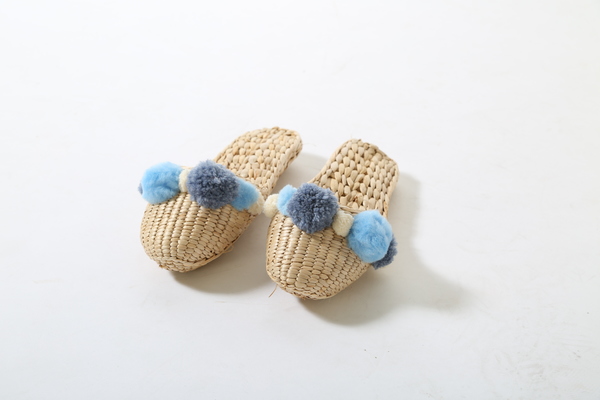 Folk Fortune handwoven slippers with Serenity blue pom poms Folk Fortune handwoven slippers with Serenity blue pom poms
