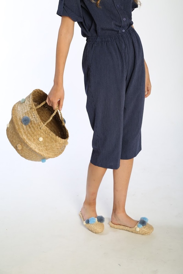 Folk Fortune handwoven slippers with Serenity blue pom poms Folk Fortune handwoven slippers with Serenity blue pom poms