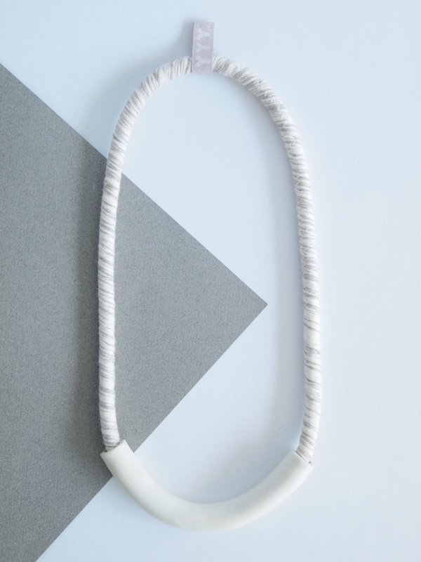 YYY tube necklace on variegated cord YYY tube necklace on variegated cord