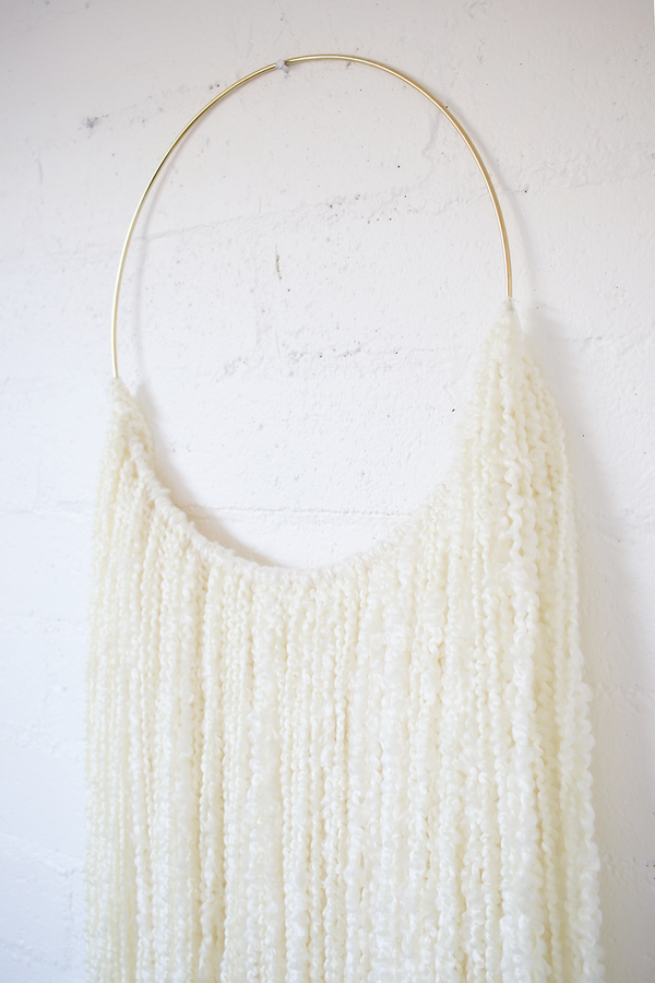 Sonadora White Fiber and Polished Brass Wall Hanging Sonadora White Fiber and Polished Brass Wall Hanging